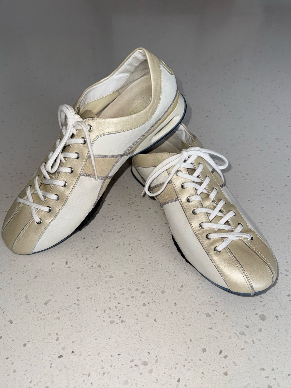 Cole Haan White and Cream Low-Top Leather Sneakers with Gold Stripes